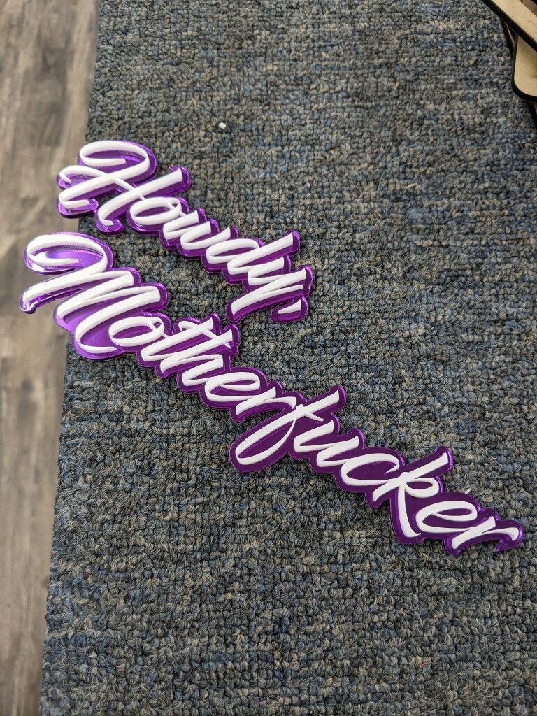 Howdy Motherfucker Car Badge - White On Mirror Purple - Script Font - Atomic Car Concepts