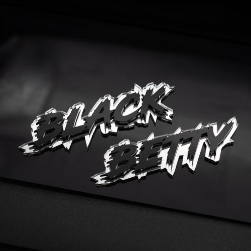 A custom text badge from Atomic Car Concepts. 