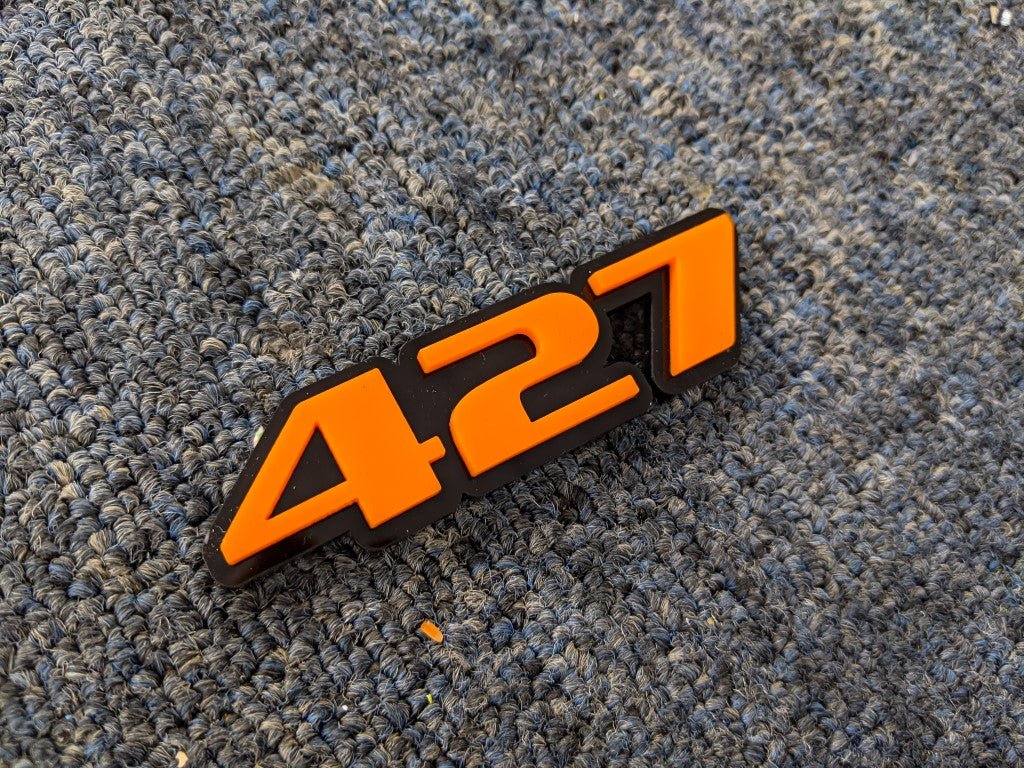 427 Car Badge - Orange On Gloss Black - OEM Font - Atomic Car Concepts