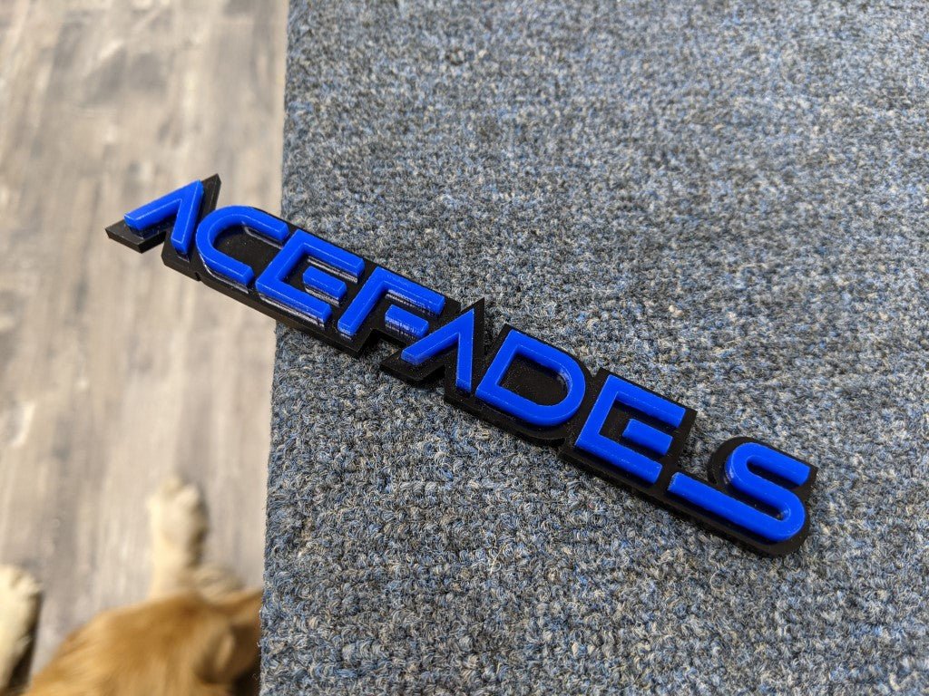 Acefades Car Badge - Blue On Gloss Black - Squid Font - Tape Mount - Atomic Car Concepts