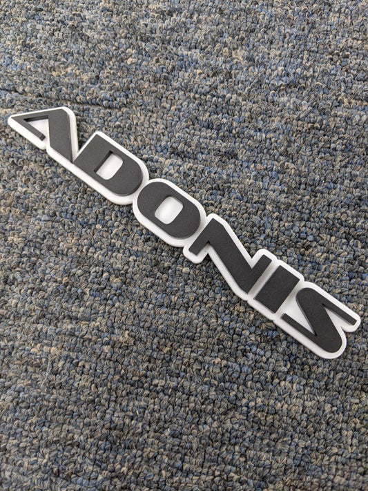 Adonis Car Badge - Matte Black On White - OEM Font - Atomic Car Concepts