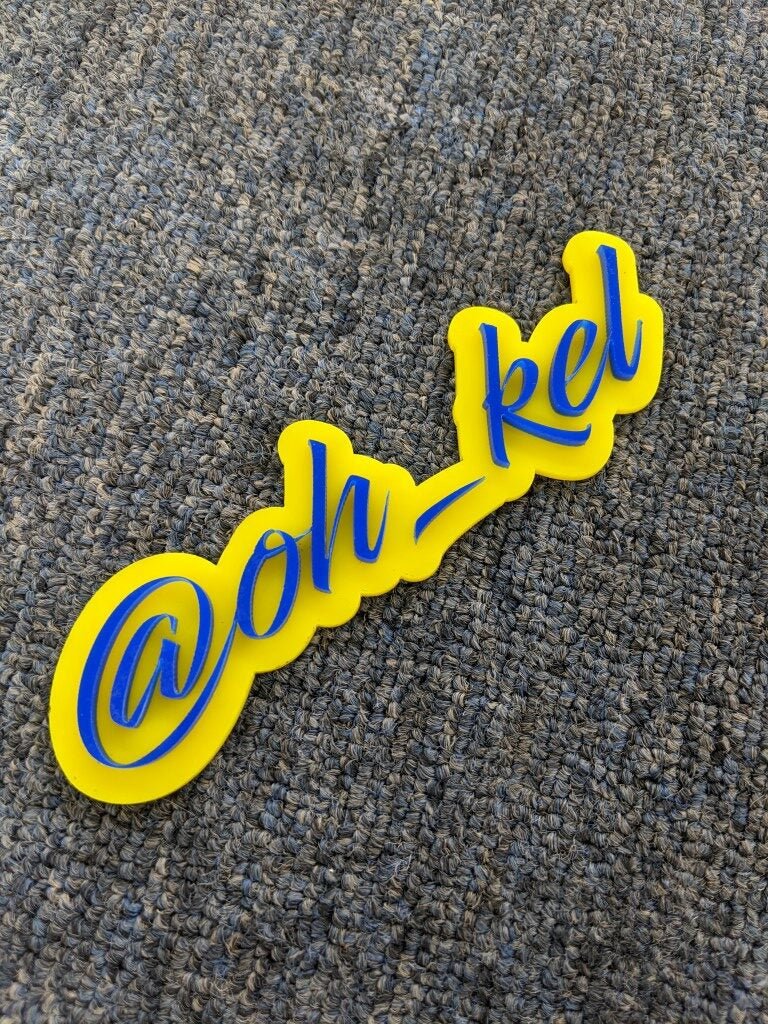 @Oh_Kel Car Badge - Blue On Yellow - Script Font – Atomic Car Concepts