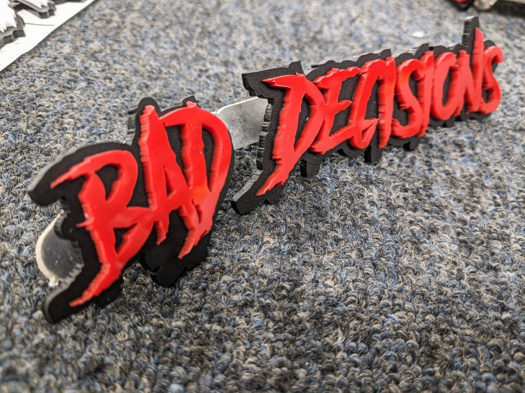 Bad Decisions Car Badge - Red on Gloss Black - Aggressive Font - Atomic Car Concepts