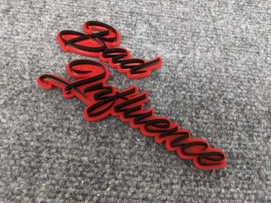 Bad Influence Car Badge - Gloss Black on Red - Script Font - Atomic Car Concepts