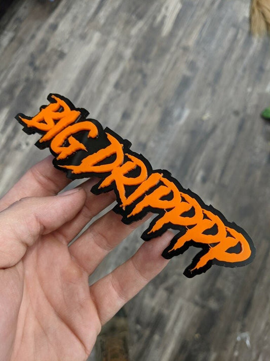 Big Dripppp Car Badge - Orange On Gloss Black - Aggressive Font - Atomic Car Concepts