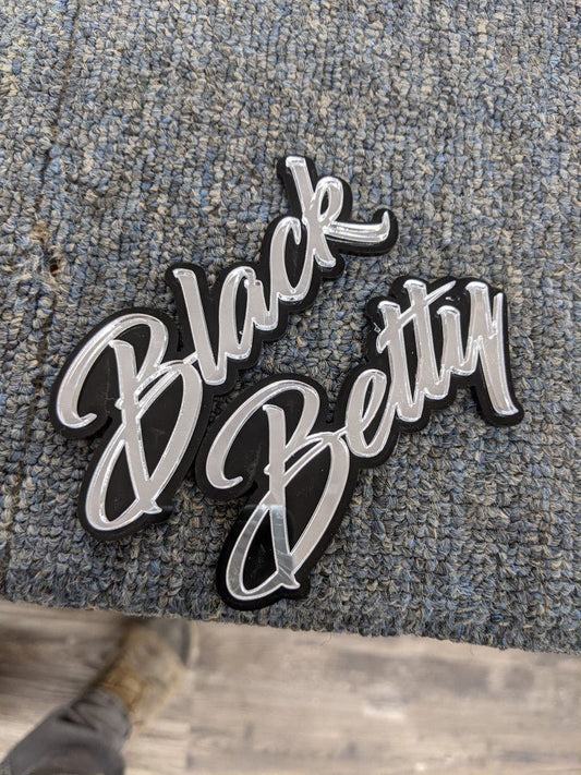 Black Betty Car Badge - Mirror Silver On Gloss Black - Script Font - Atomic Car Concepts