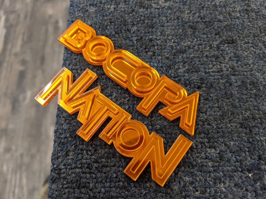 Bocopa Nation Car Badge - Mirror Orange On Mirror Orange - Squid Font - Tape Mount - Atomic Car Concepts