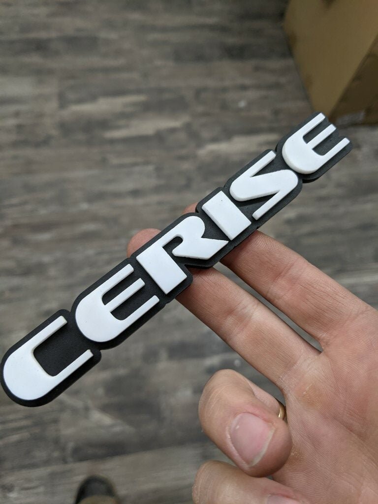 Cerise Car Badge - White On Matte Black - OEM Font - Atomic Car Concepts