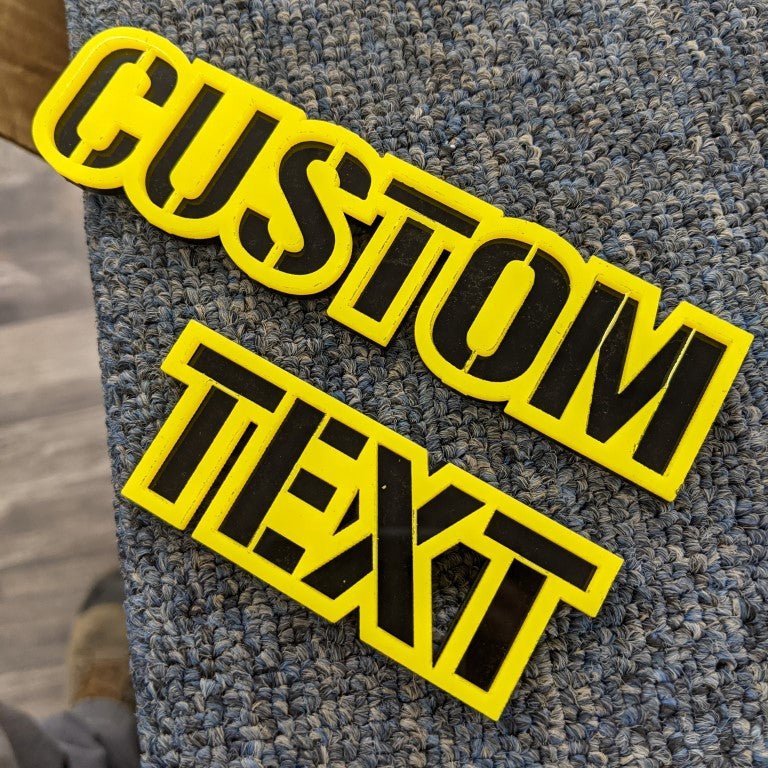 Custom Text Car Badge - Yellow On Gloss Black - Stencil Font - Tape Mount - Atomic Car Concepts