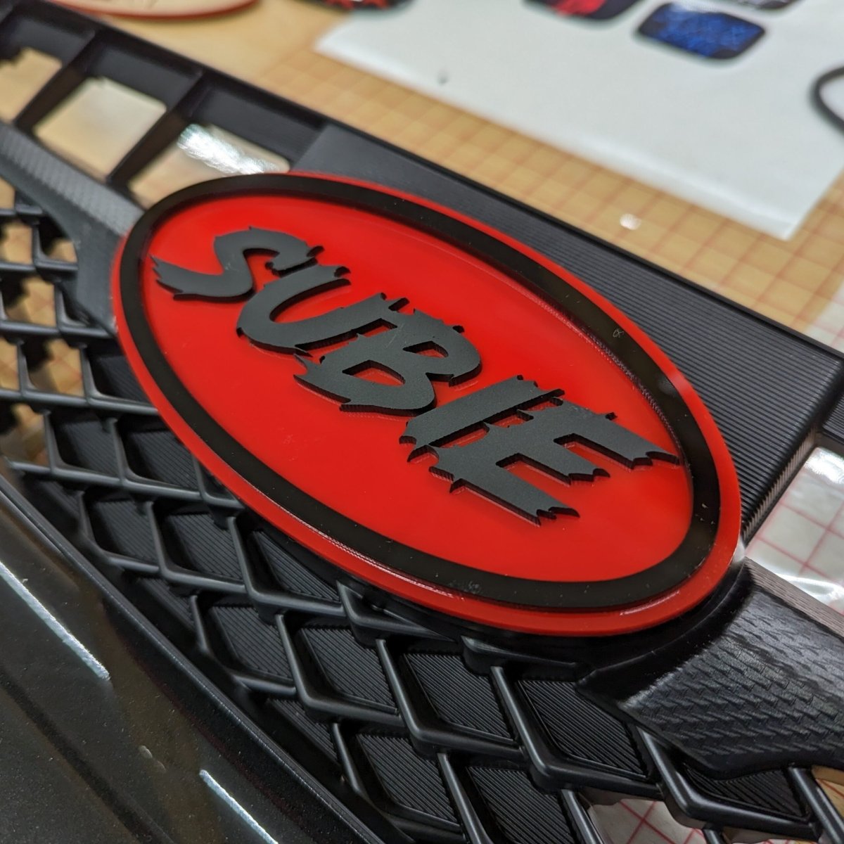 Custom Text Oval Emblem - Fits 2015-2019 Subaru® WRX Grille - Lightning Font - Atomic Car Concepts