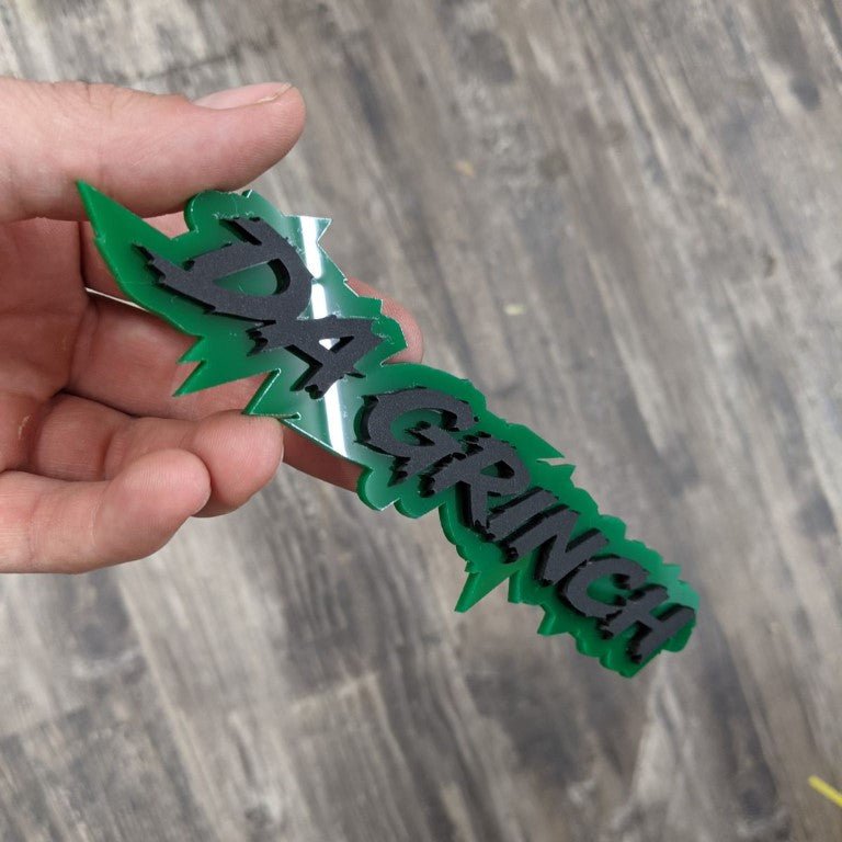 Da Grinch Car Badge - Matte Black On Green - Lightning Font - Atomic Car Concepts