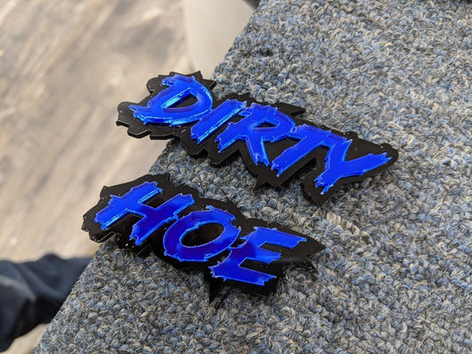 Dirty Hoe Car Badge - Mirror Blue On Gloss Black - Lightning Font