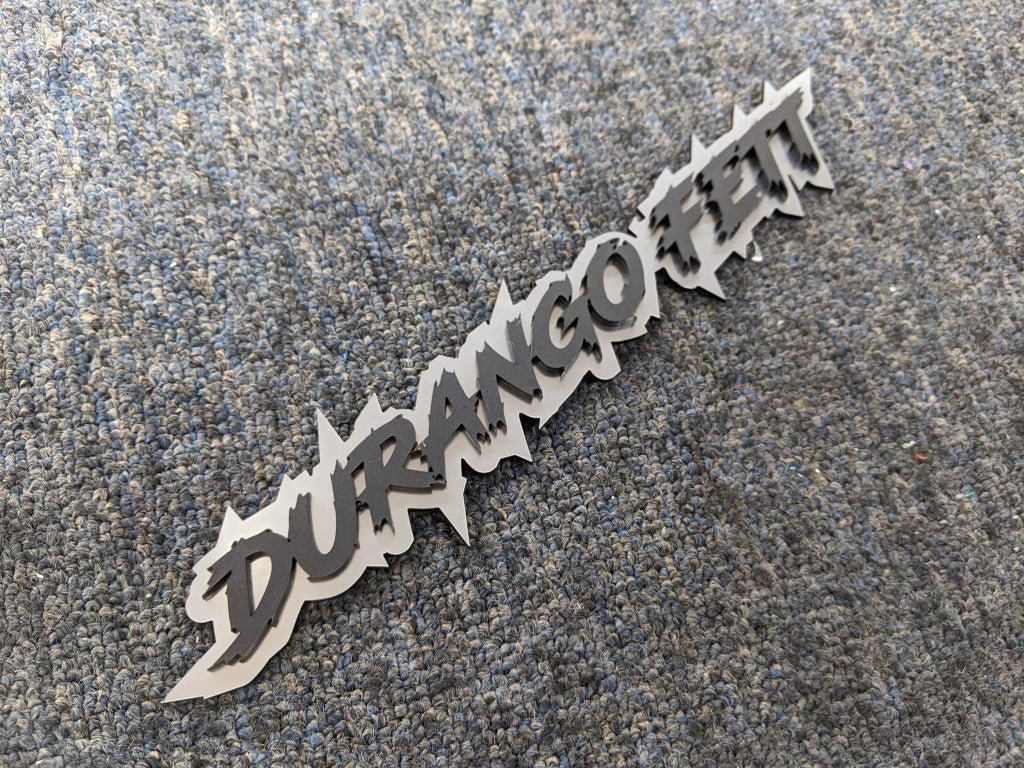 Durango Fett Car Badge - Matte Black on Brushed Silver - Lightning Font - Atomic Car Concepts