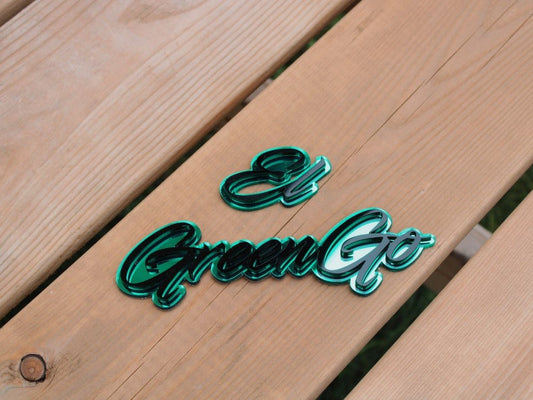 El Green Go Car Badge - Gloss Black On Mirror Green - Script Font - Atomic Car Concepts