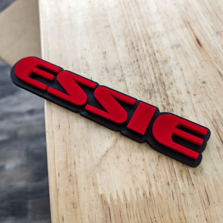 Essie Car Badge - Red On Gloss Black - OEM Font - Atomic Car Concepts