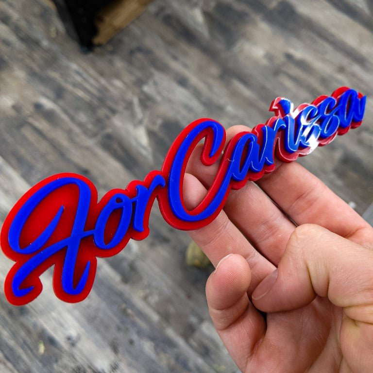 For Carissa Car Badge - Blue on Red - Script Font - Tape Mounting - Atomic Car Concepts
