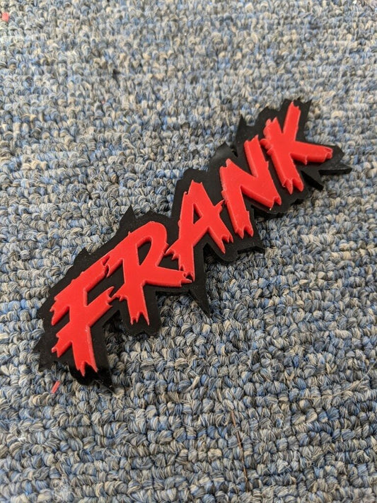 Frank Car Badge - Red On Gloss Black - Lightning Font