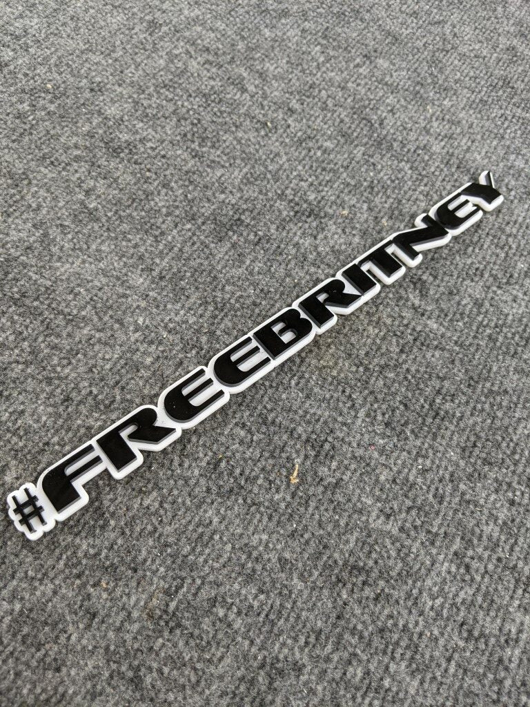 FreeBritney Car Badge - Gloss Black on White - OEM Font - Atomic Car Concepts