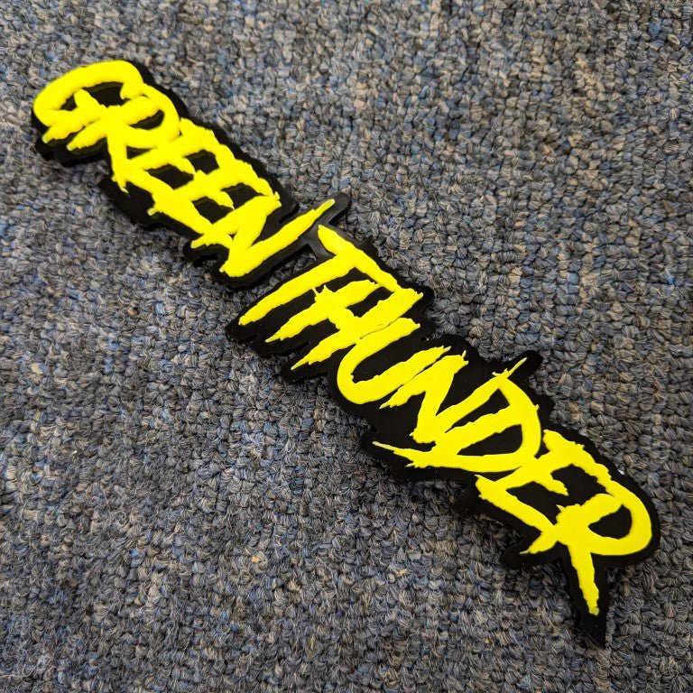 Green Thunder Car Badge - Yellow on Gloss Black - Aggressive Font - Tape Mounting - Atomic Car Concepts