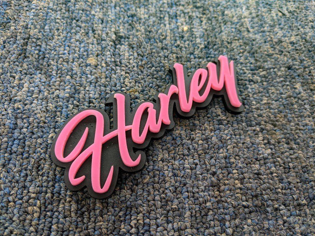 Harley Car Badge - Pink on Matte Black - Script Font - Tape Mounting - Atomic Car Concepts