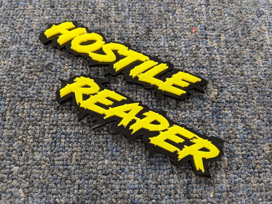 Hostile Reaper Car Badge - Yellow On Gloss Black - Lightning Font - Atomic Car Concepts