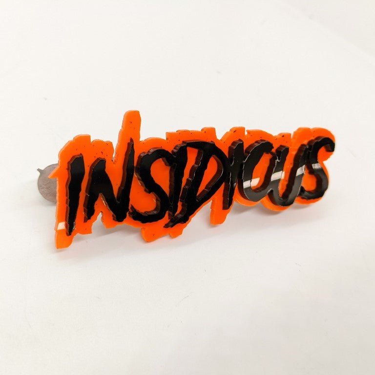 Insidious Car Badge - Gloss Black on Orange - Aggressive Font - Atomic Car Concepts