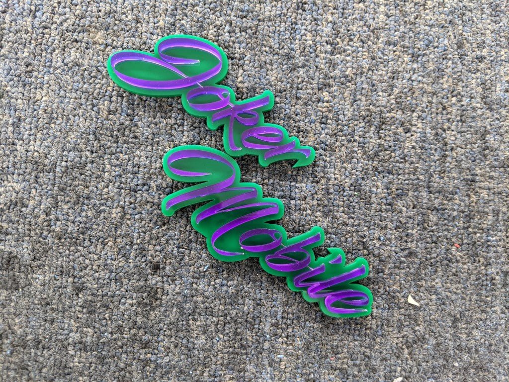 Joker Mobile Car Badge - Mirror Purple on Green - Script Font - Atomic Car Concepts
