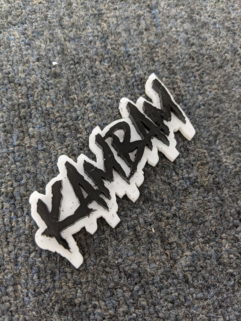 Kambam Car Badge - Gloss Black On White - Aggressive Font - Atomic Car Concepts