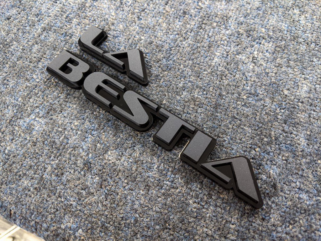 La Bestia Car Badge - Matte Black On Gloss Black - OEM Font - Atomic Car Concepts