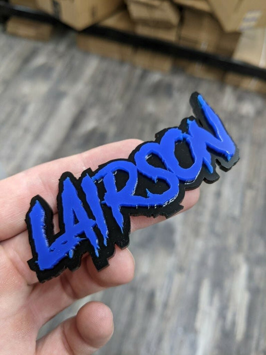 Lairson Car Badge - Blue on Gloss Black - Lightning Font - Tape Mounting - Atomic Car Concepts