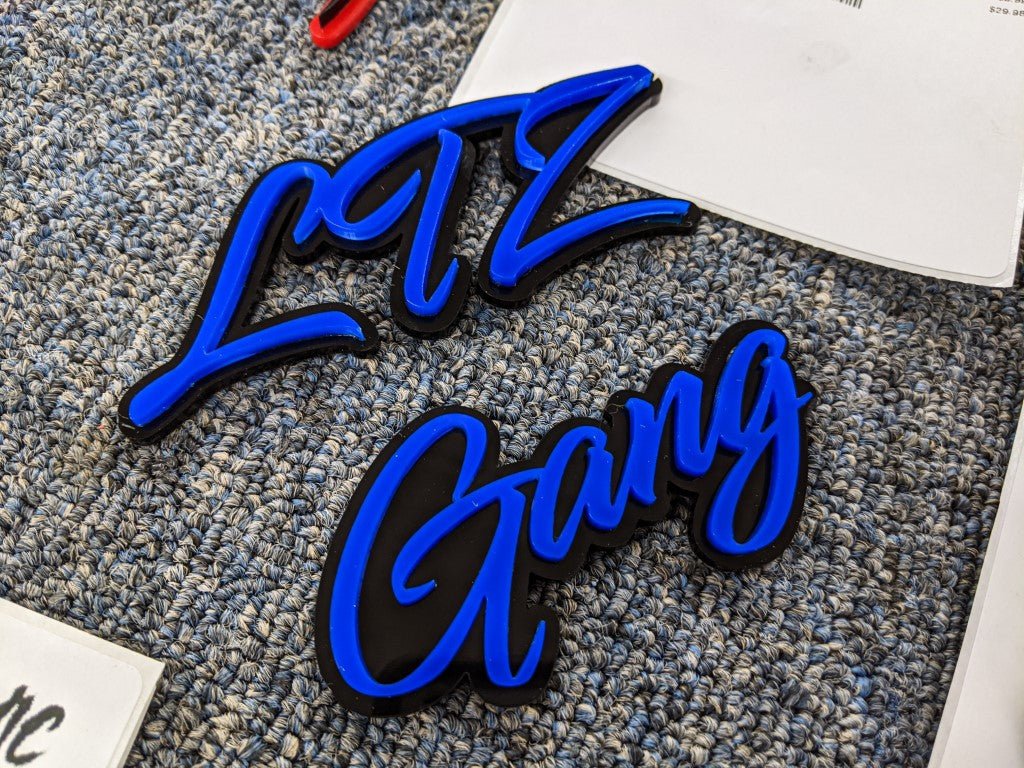 LTZ Gang Car Badge - Blue On Gloss Black - Script Font - Tape Mounting - Atomic Car Concepts