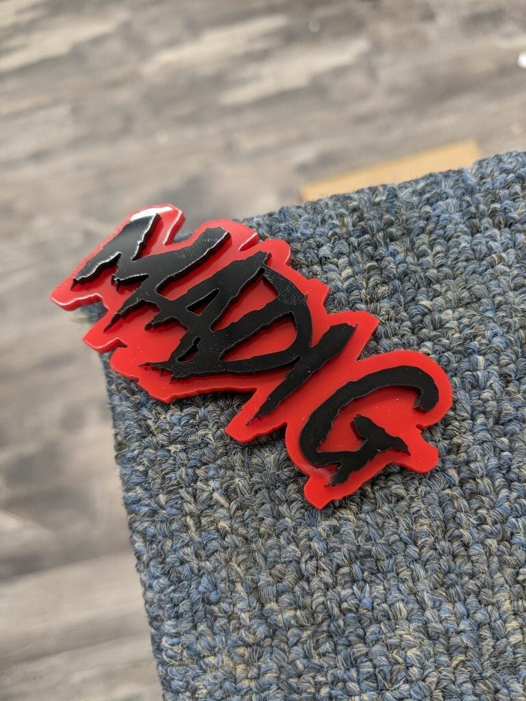 Madig Car Badge - Gloss Black On Red - Aggressive Font - Atomic Car Concepts