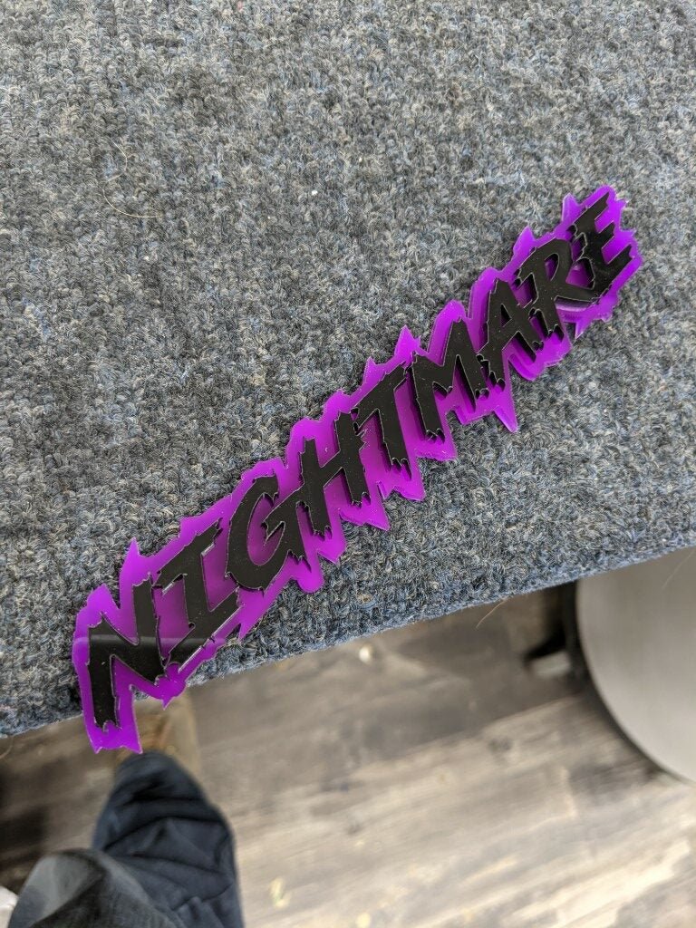 Nightmare Car Badge - Gloss Black On Purple - Lightning Font - Atomic Car Concepts