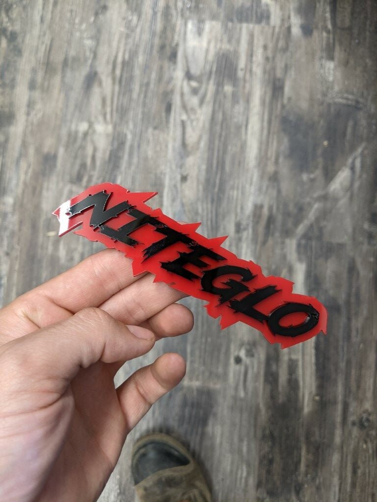 Niteglo Car Badge - Gloss Black on Red - Lightning Font - Atomic Car Concepts