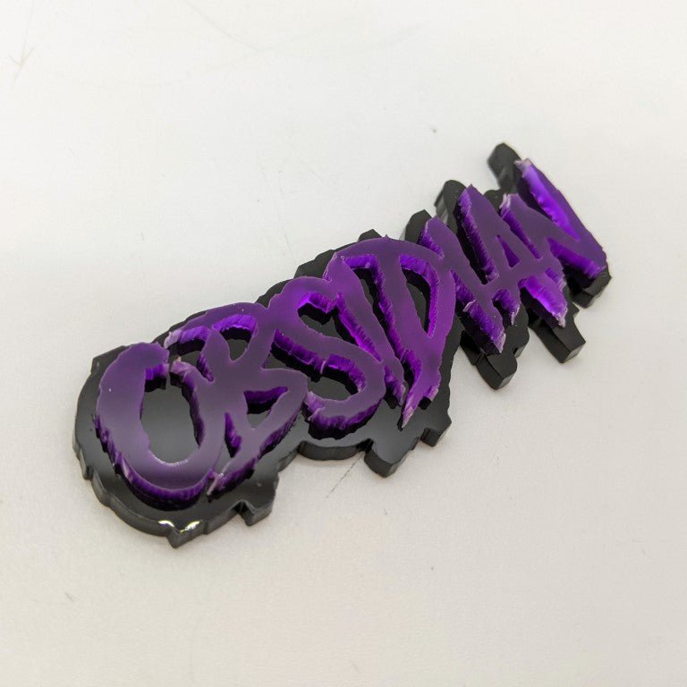 Obsidian Car Badge - Mirror Purple on Gloss Black - Aggressive Font - Tape Mounting - Atomic Car Concepts