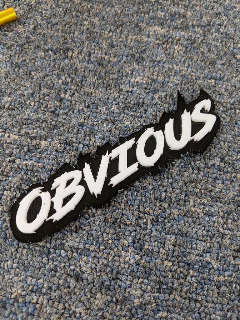 Obvious Car Badge - White On Gloss Black - Lightning Font - Atomic Car Concepts