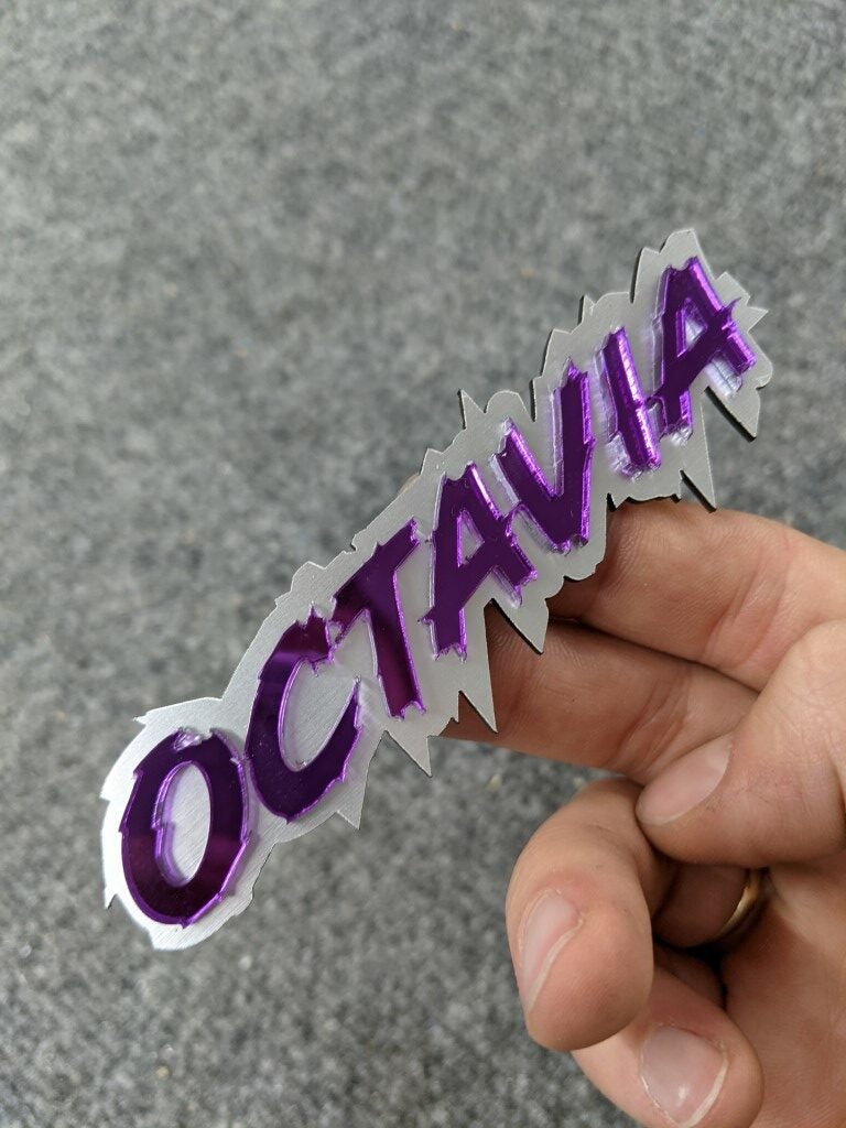 Octavia Car Badge - Mirror Purple On Brushed Silver - Aggressive Font - Atomic Car Concepts