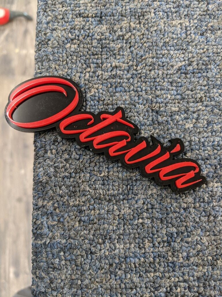 Octavia Car Badge - Red On Gloss Black - Script Font – Atomic Car Concepts