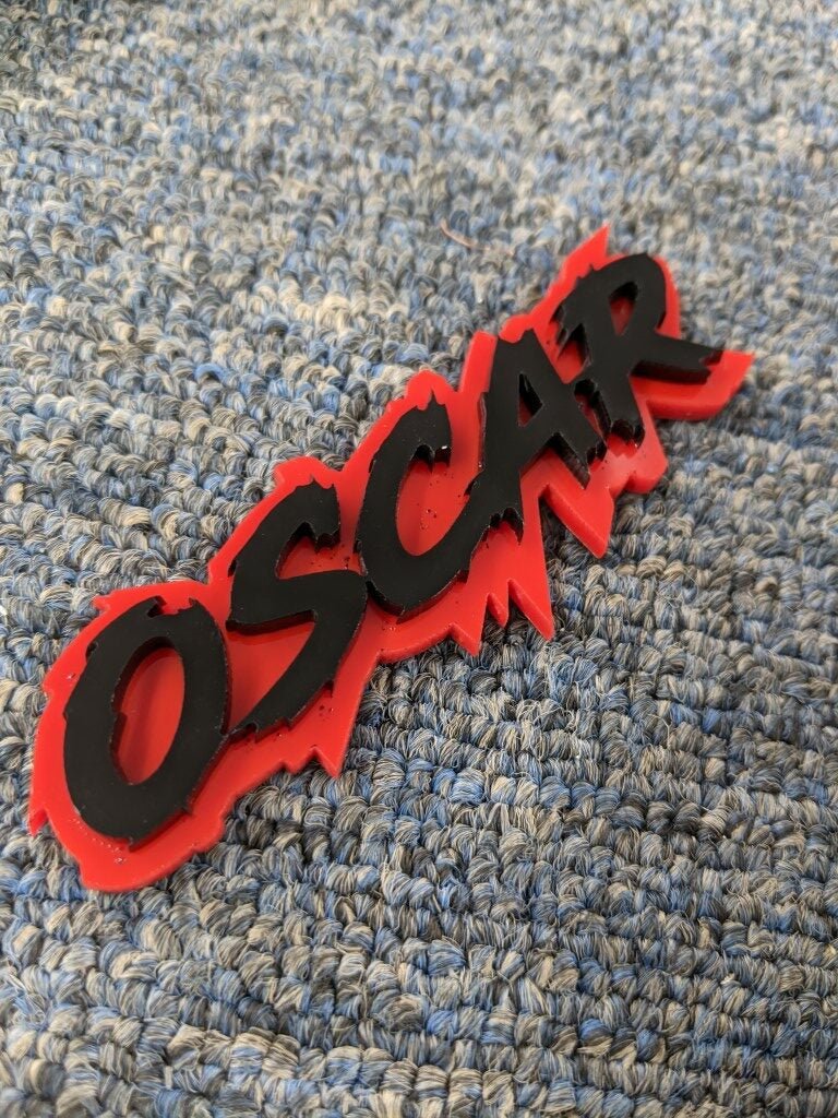 Oscar Car Badge - Gloss Black On Red - Lightning Font - Atomic Car Concepts