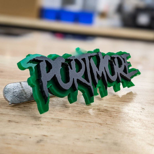 Portmore Car Badge - Matte Black on Green - Aggressive Font - Atomic Car Concepts