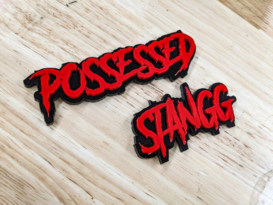 Possessed Stangg Car Badge - Red on Gloss Black - Aggressive Font - Tape Mounting - Atomic Car Concepts