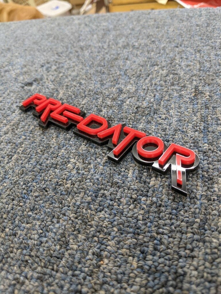 Predator Car Badge - Red On Gloss Black - Squid Font - Tape Mount - Atomic Car Concepts