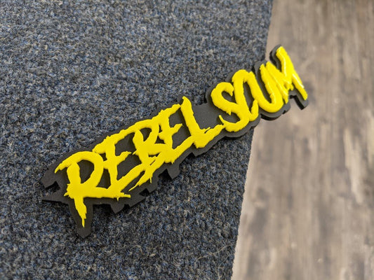 Rebel Scum Car Badge - Yellow On Matte Black - Aggressive Font - Atomic Car Concepts