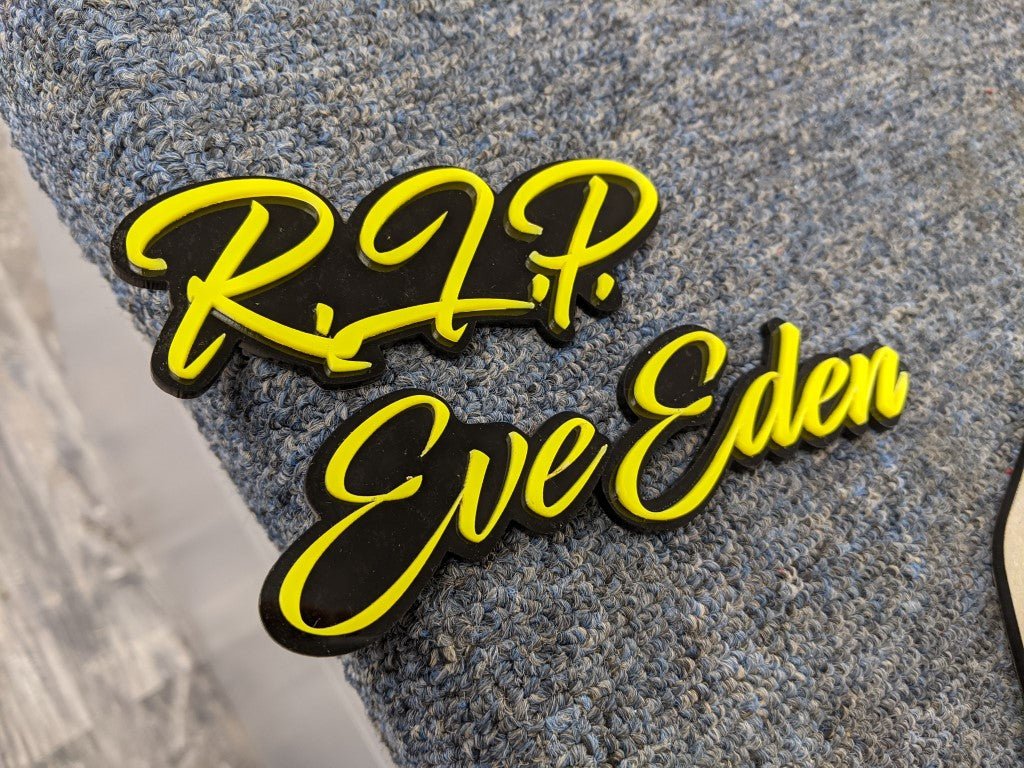 RIP-Eve Eden Car Badge - Yellow on Gloss Black - Script Font - Atomic Car Concepts