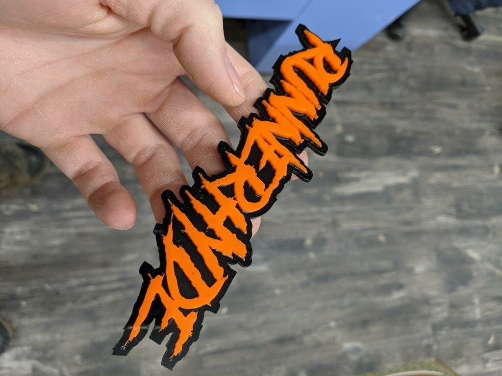 Runnerhyde Car Badge - Orange On Gloss Black - Aggressive Font - Atomic Car Concepts