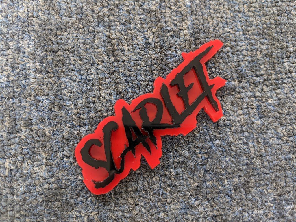 Scarlet Car Badge - Gloss Black on Red - Aggressive Font - Tape Mounting - Atomic Car Concepts