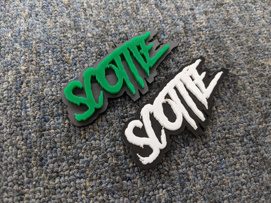 Scottie Car Badges - Green and White on Matte Black And Grey - Aggressive Font - Atomic Car Concepts