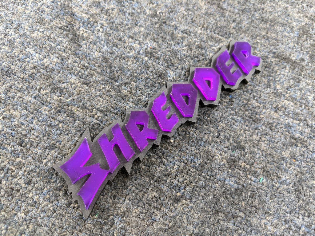 Shredder Car Badge - Purple on Matte Black - Tape Mounting - Atomic Car Concepts