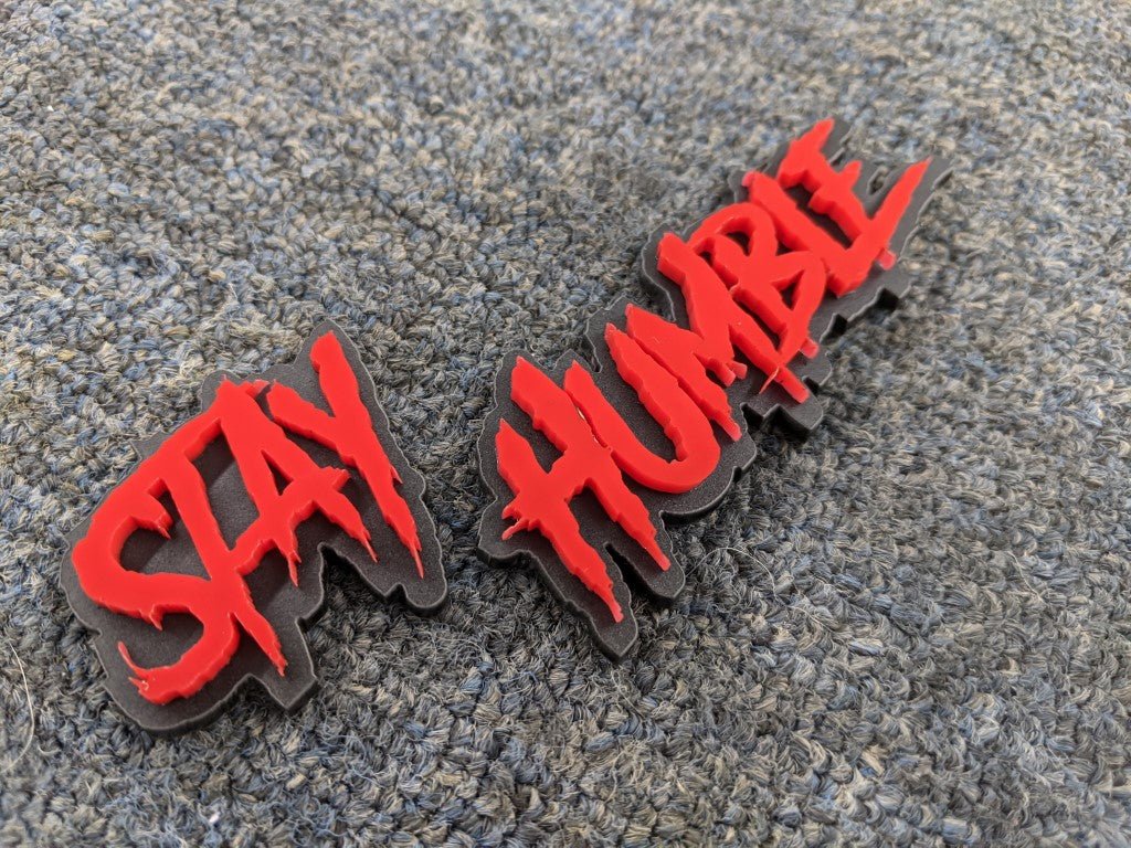 Stay Humble Car Badge - Red On Matte Black - Aggressive Font - Atomic Car Concepts