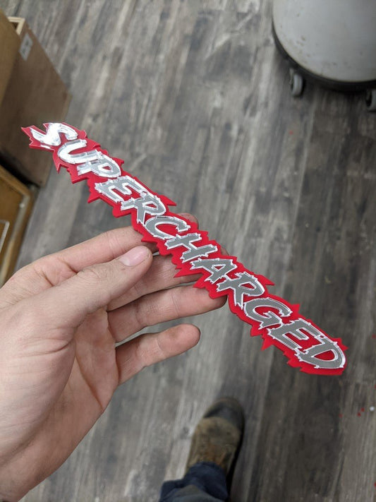 Supercharged Car Badge - Mirror Silver On Red - Lightning Font - Atomic Car Concepts